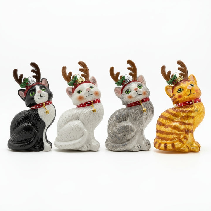 Set of four handmade glass Christmas ornaments featuring red, white, black, and gray kittens wearing reindeer antlers by Edmo