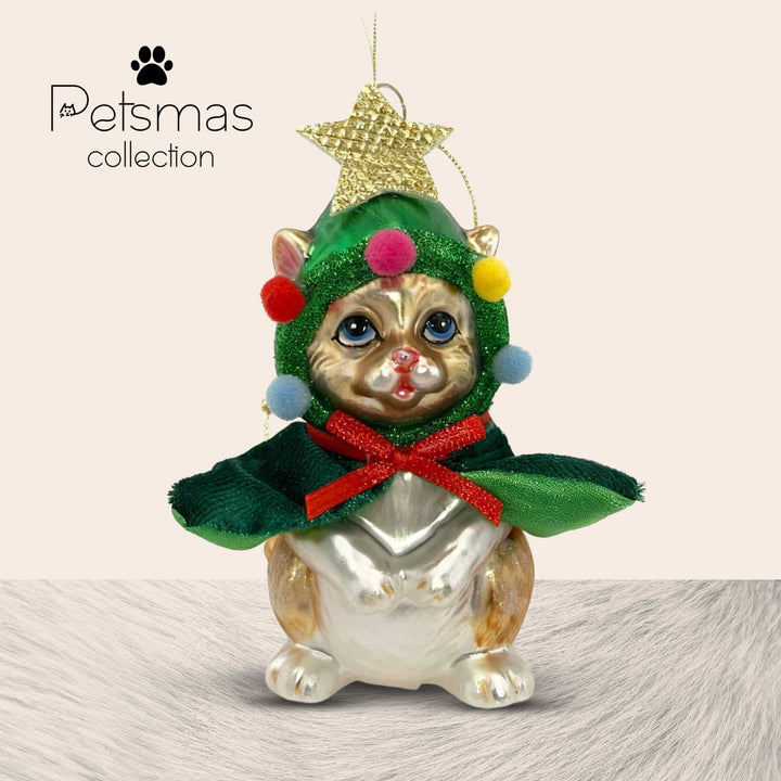 Golden cat wearing Christmas tree cape ornament with star topper and pompoms, handcrafted glass decoration