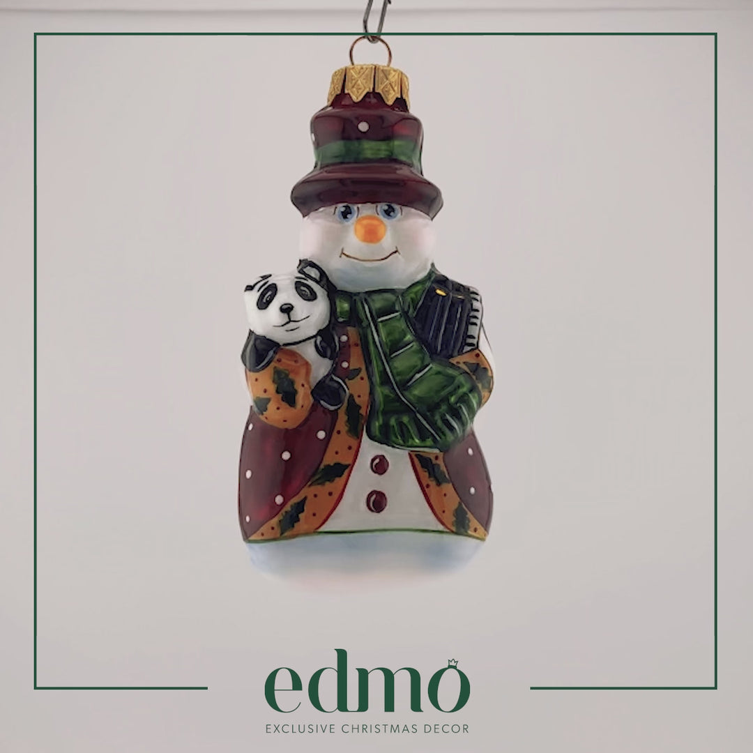 Video of snowman glass christmas ornament with his pet