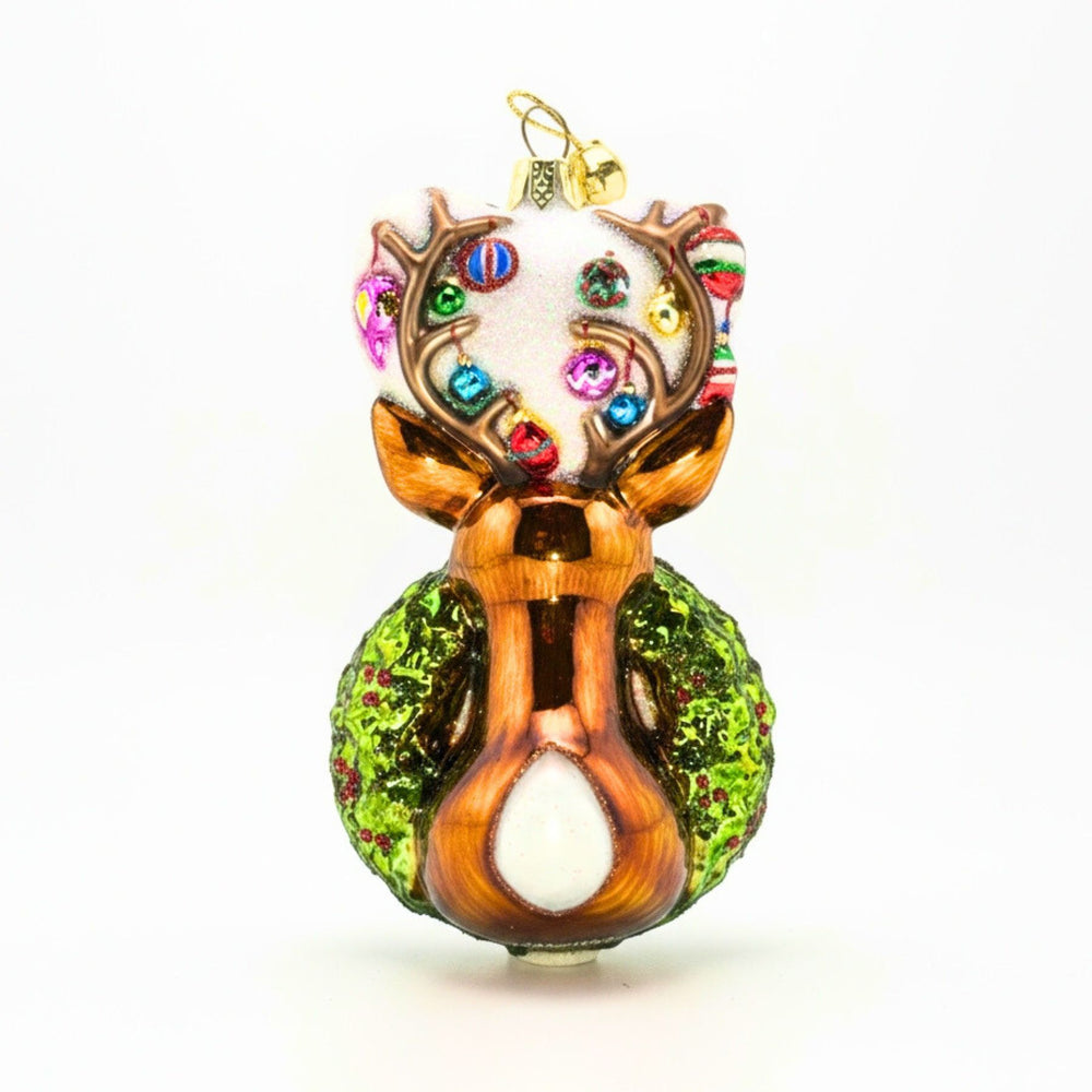 Traditional Christmas wreath glass ornament with back of reindeer head.