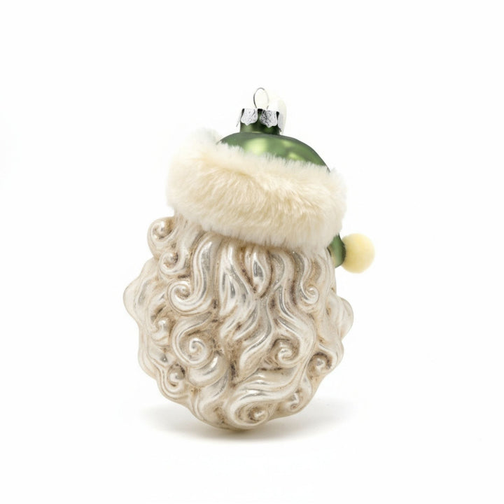 Hand-painted glass Christmas ornament depicting Santa's face with a green hat and white fur trim