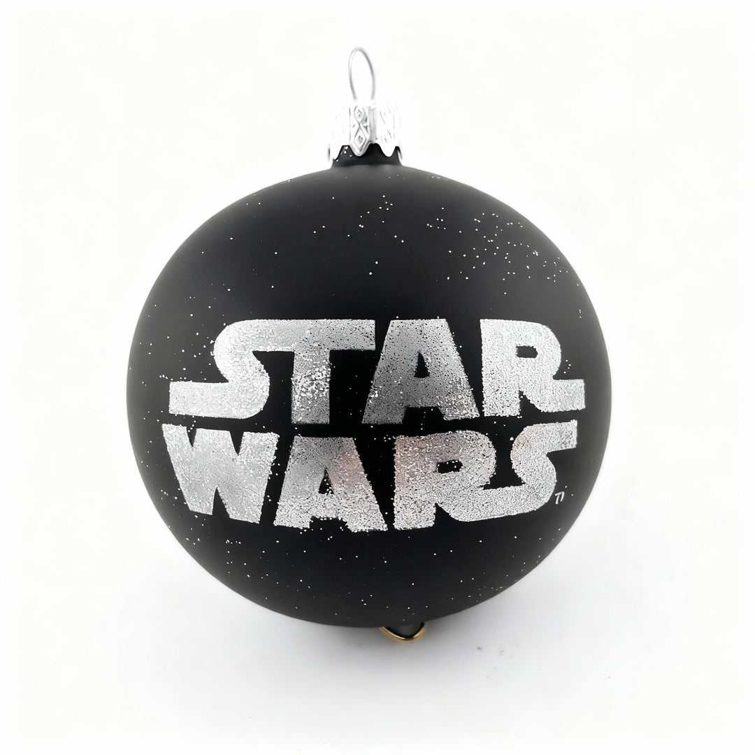 Exclusive Star Wars black glass Christmas ornament with glitter Star Wars logo. Perfect collectible holiday decoration for fans and collectors.