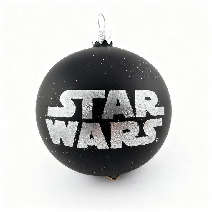 Exclusive Star Wars black glass Christmas ornament with glitter Star Wars logo. Perfect collectible holiday decoration for fans and collectors.