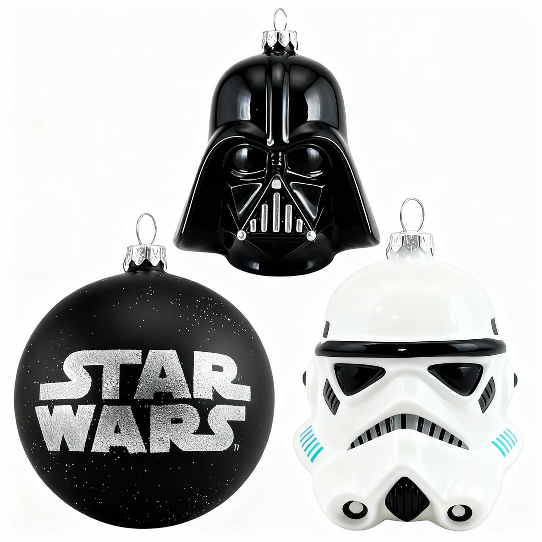 Cozy festive holiday setting featuring three Star Wars glass Christmas ornaments: Darth Vader helmet, Imperial Guard helmet, and black sphere with Star Wars logo, perfect for exclusive Christmas decor by edmodecor.com